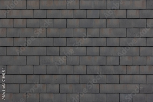 Old dark grey stone tiles with rust stain, Abstract shingles bricks texture, Geometric pattern background, Details of roof top material, Can be used as background for display or montage your products.