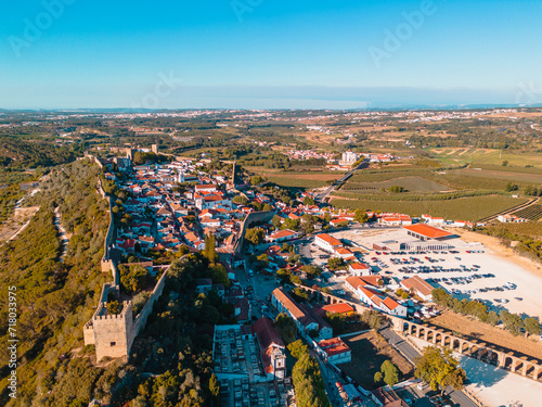 Above Óbidos: Aerial Vistas of the Enchanting Portuguese Village Nestled Amidst Historic Walls and Lush Greenery