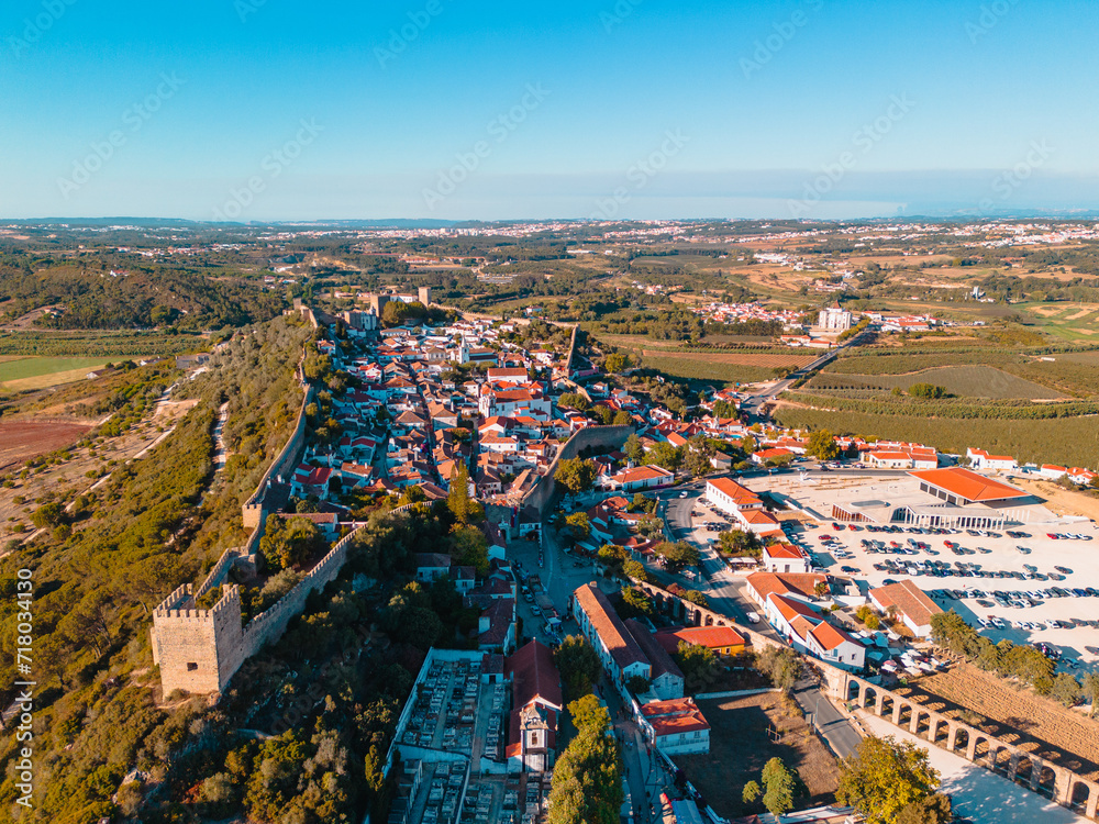 Above Óbidos: Aerial Vistas of the Enchanting Portuguese Village Nestled Amidst Historic Walls and Lush Greenery