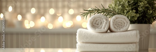 Soothing spa setup with soft towels, herbal bags, and beauty treatment essentials