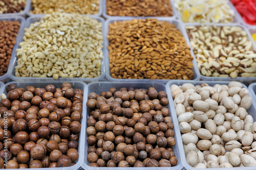 Dried fruits, nuts and sweets are a colorful display at the farmer's market. Dried fruits, nuts and sweets are a colorful display at the farmer's market.
