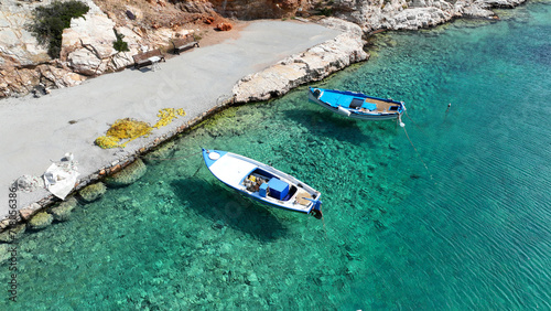 Aerial drone photo of beautiful secluded fjord shaped cove of Tourkopigado, Irakleia island, small Cyclades, Greece photo