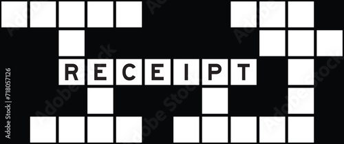 Alphabet letter in word receipt on crossword puzzle background