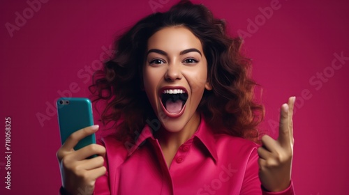 excited play games by mobile phone make winner gesture. winning mobile gambling. Wow face expression. Esport streaming game online, surprise, gamer, online, earning, new generation. photo