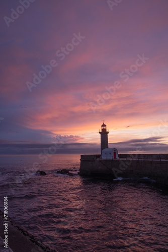 lighthouse at sunset in Porto