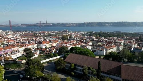 aerial view of the recovery of Lisbon buildings, with their facades facing the Tagus River, showcasing the city's revitalisation and architectural charm. photo