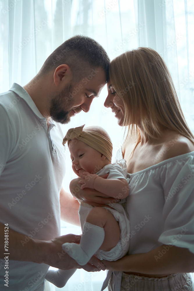 adorable parents with their little baby adorable parents with their little baby