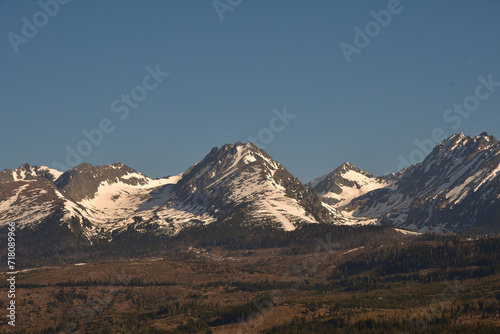Snowy scenery of peak mountains and forests in the winter High Tatras Slovakia 