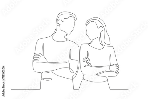 A couple taking a photo looking at each other