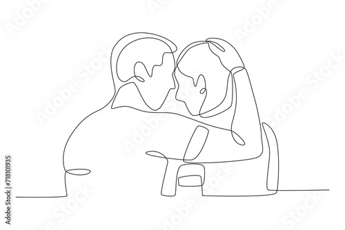 Photo of a couple holding their girlfriend's hair