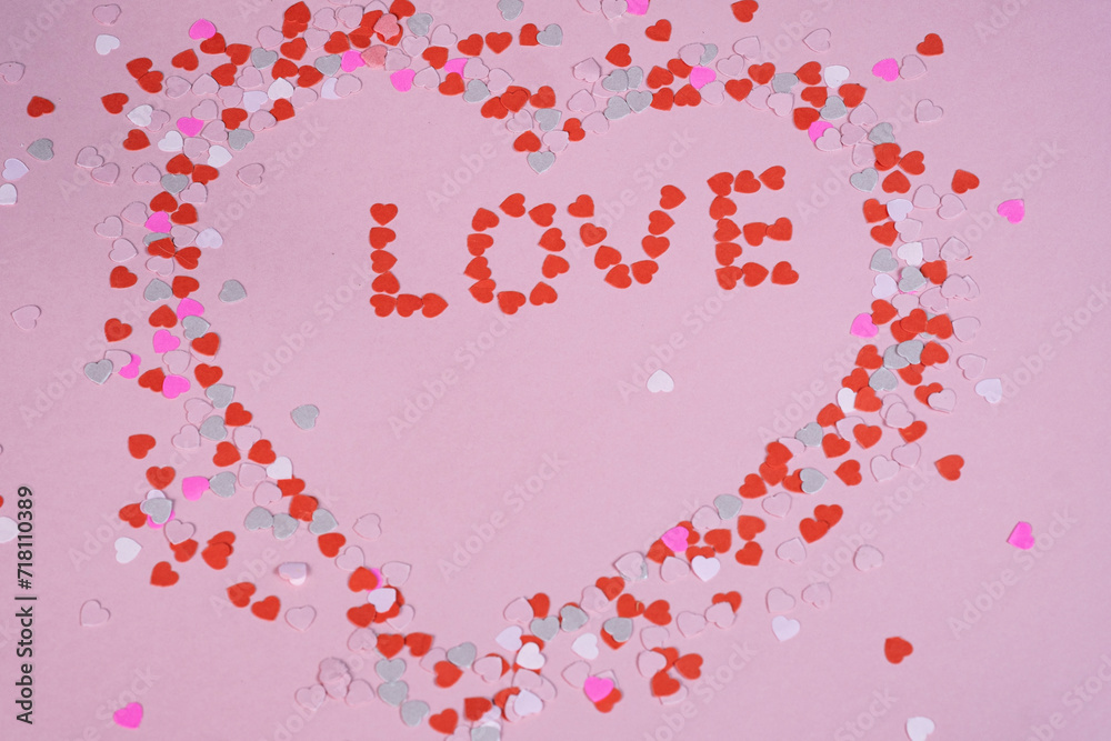 Valentine's day background, pink color, paper hearts. Congratulations on February 14th.