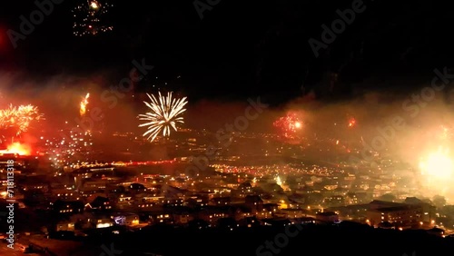 4K. loop seamless of real fireworks background. Abstract blur of real golden shining fireworks