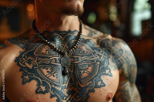 a man with a detailed cross tattoo on his chest, which is complemented by a statement necklace for a bold and stylish look.