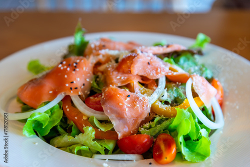 Salmon salad,close up image, clean eating fresh salmon and salad vegetable healthy food diet concept.