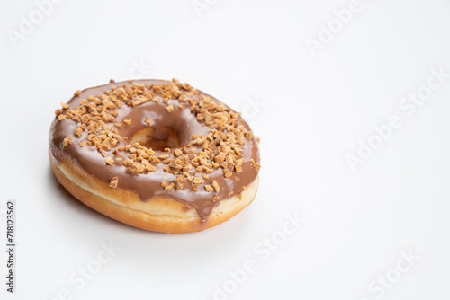 Chocolate peanut doughnut isolated on a white background