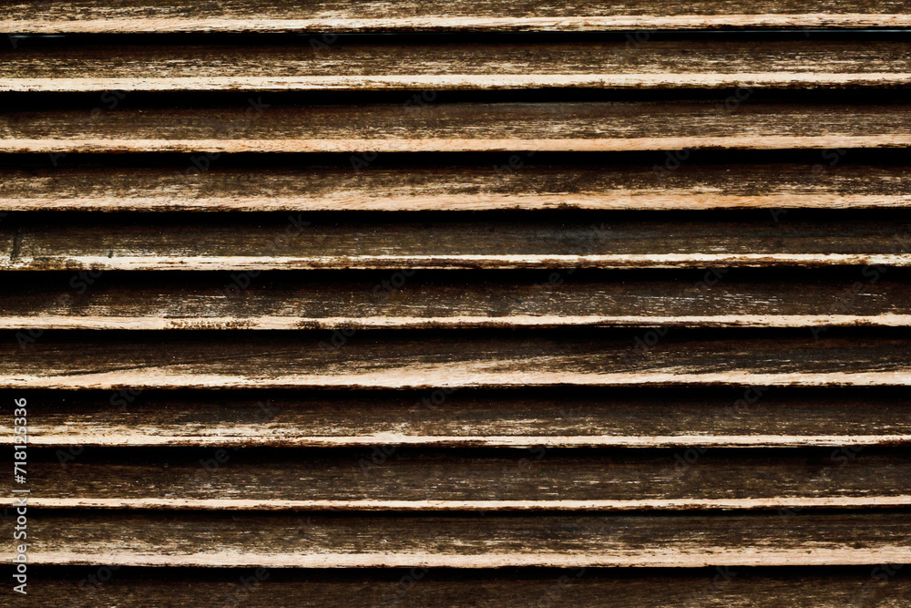 Grunge wood stripes. Raw brown wooden wall background. Rustic tree desk with knots pattern. Countryside architecture wall. Village building construction. Brown wood texture. Wooden lines pattern. Grunge wood stripes. Raw brown wooden wall background. Rustic tree desk with knots pattern. Countryside architecture wall. Village building construction. Brown wood texture. Wooden lines pattern.