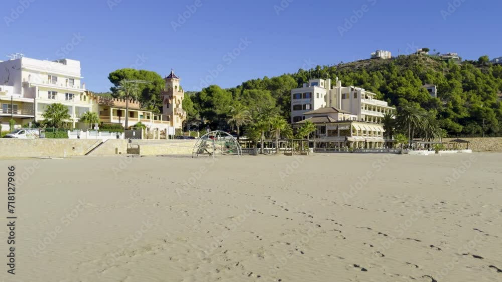 Walk through a sunny city. Walk through the city of Benicassim by the sea in winter. Warm sunny day at the end of December. Province of Castellon. Spain sea in winter. Slow motion Walk through a sunny city. Walk through the city of Benicassim by the sea in winter. Warm sunny day at the end of December. Province of Castellon. Spain sea in winter. Slow motion