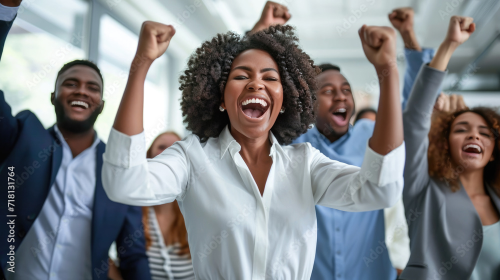 Success Workers Joyful office workers are celebrating a success with their hands raised ...