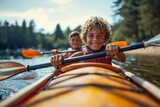 Two adventurous children paddle through the serene waters in their kayak, surrounded by towering trees and the vast blue sky, fully equipped with life jackets and sporting determined expressions on t
