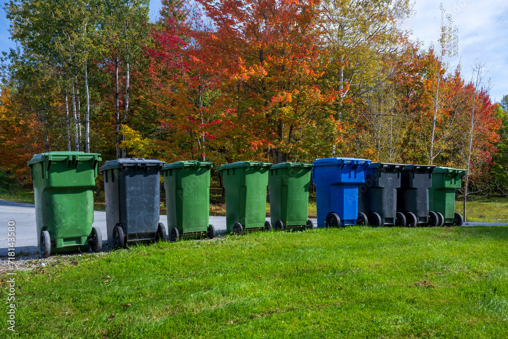 Garbage and recycling bins in the Quebec fall colors Garbage and recycling bins in the Quebec fall colors