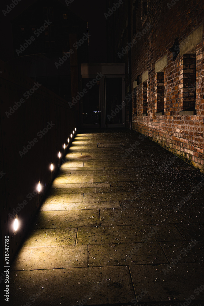 Illuminted Victorian Brick Warehouse Windows At The Historic Docks At Gloucester At Night