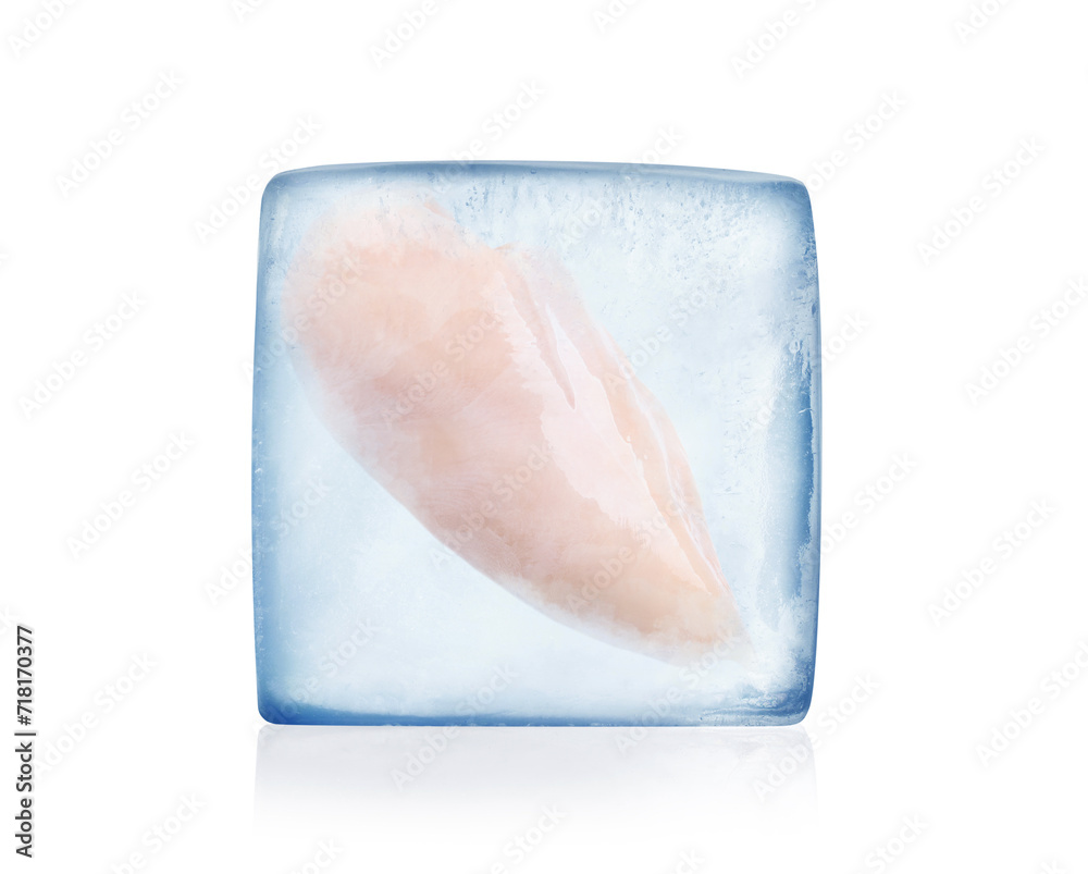Fototapeta premium Frozen food. Raw chicken breast in ice cube isolated on white