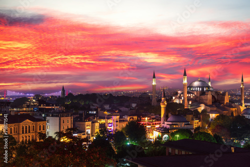 Sunset view over Hagia Sophia and the Bosphorus Bridge of Istanbul, view on the city skyline, Turkey