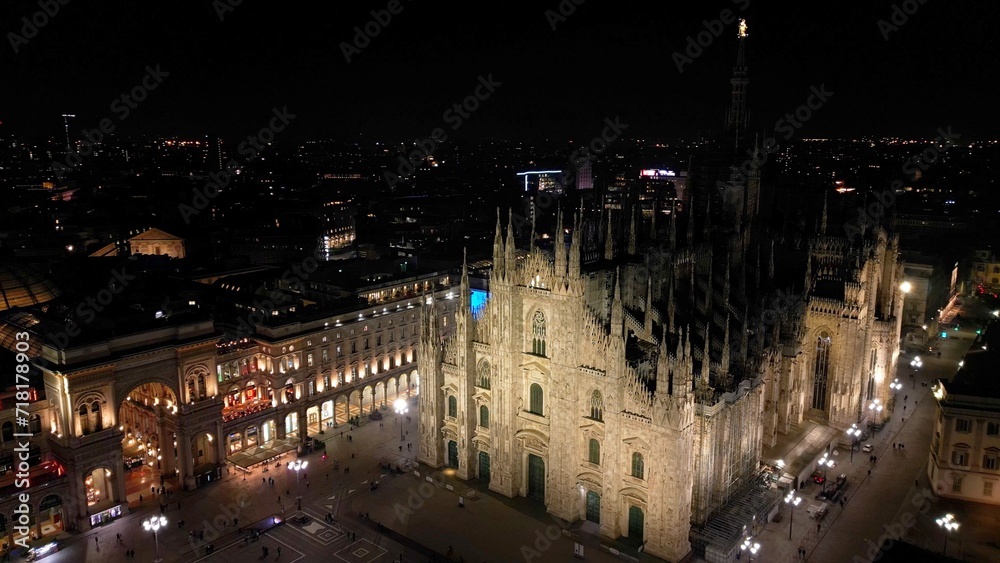 EUROPE, ITALY, MILAN 01-24-2024 Milan  Cathedral Piazza Duomo by night drone aerial view - sightseeing and tourist attraction in downtown of the fashion city - new skyline 