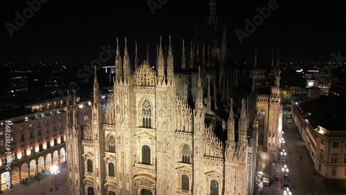 EUROPE, ITALY, MILAN 01-24-2024 Milan  Cathedral Piazza Duomo by night drone aerial view - sightseeing and tourist attraction in downtown of the fashion city - new skyline 