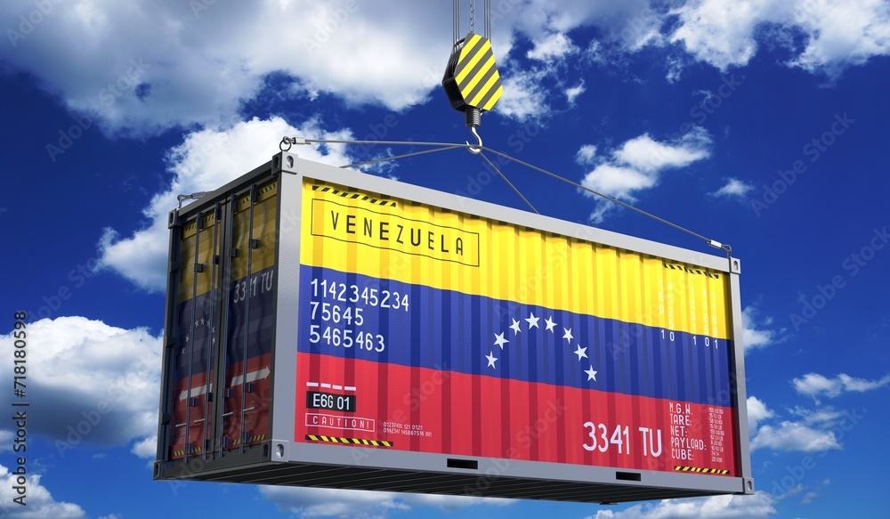 Freight shipping container with national flag of Venezuela hanging on crane hook - 3D illustration