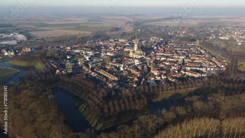 Aerial view of the historic city of Hulst surrounded by an eight-pointed star-shaped canal in the southern part of the Netherlands in the Zeeland region
