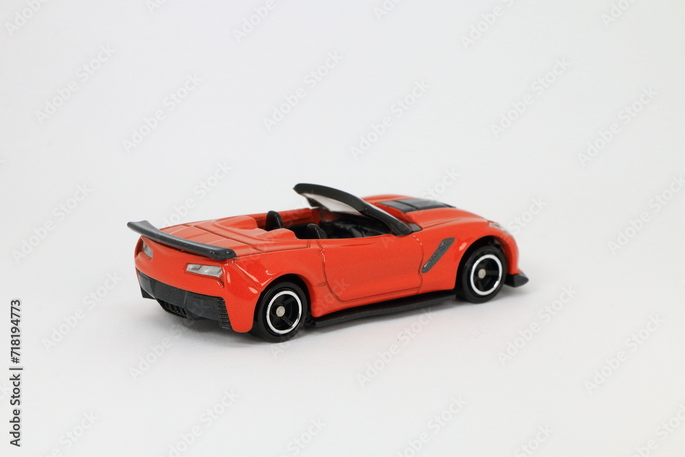 toy car isolated on white background, Sport car, super car, orange coupe, die cast car, toy car, white background toy car isolated on white background, Sport car, super car, orange coupe, die cast car, toy car, white background