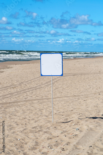 white empty signboard on the Baltic beach