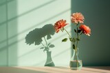  a vase filled with pink flowers sitting on a table next to a shadow of a wall and a vase with a shadow of a flower on the side of a table.