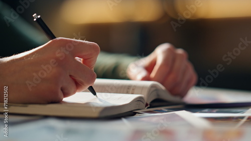 Wallpaper Mural Woman hands writing notebook holding pen indoors close up. Girl making notes  Torontodigital.ca