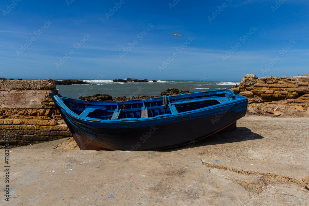 Wooden fishing boat on the waterfront of the old port. Essaouira, Morocco, Africa