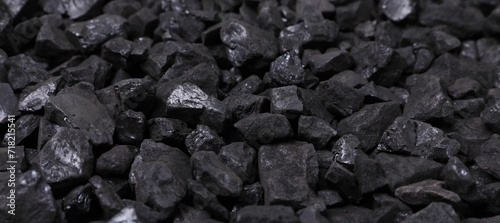 Pieces of black coal as background, closeup © New Africa