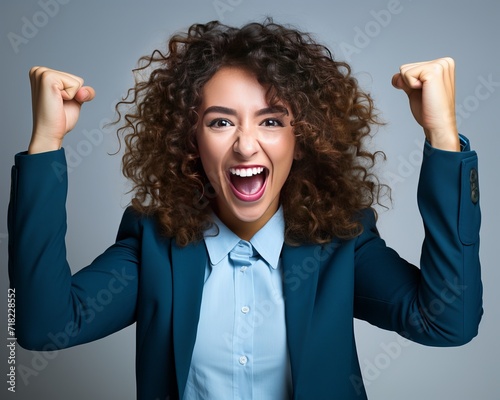 a curly-haired young woman celebrates victory, generative ai
