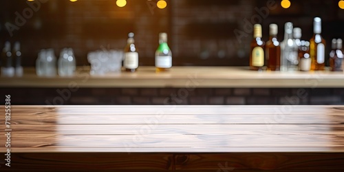 Clear the wooden table and blurry bar counter for product display.