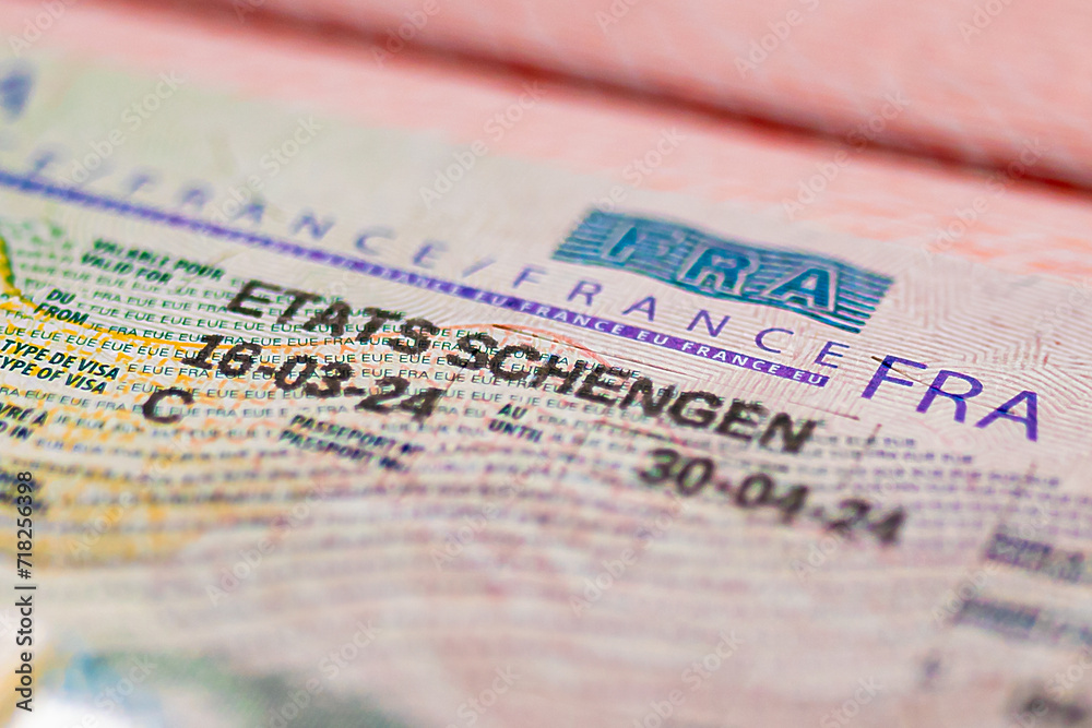 Fototapeta premium Close up Schengen visa of France in the passport. closed border of EC