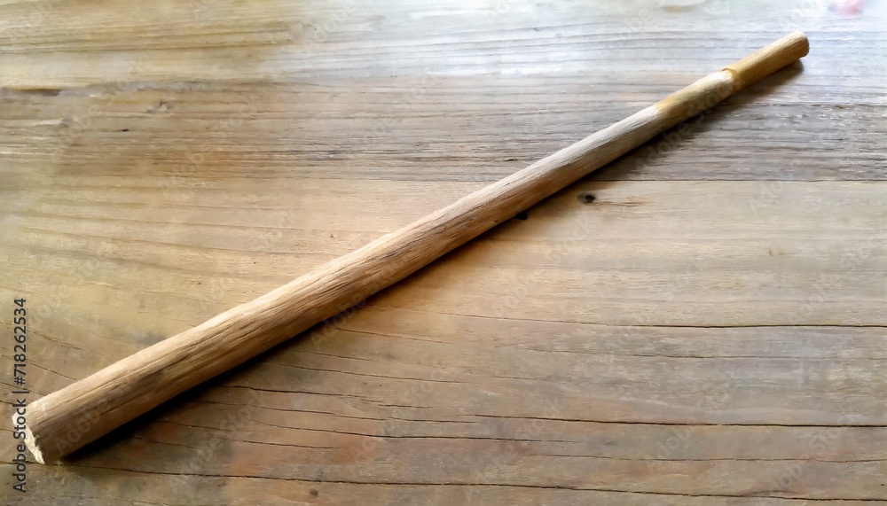 wooden stick isolated on wooden background