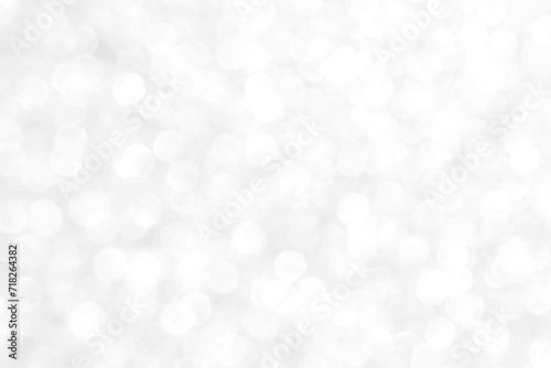 White and gray bokeh background. The concepts of New Year, Christmas, Wedding Anniversary and all celebrations.