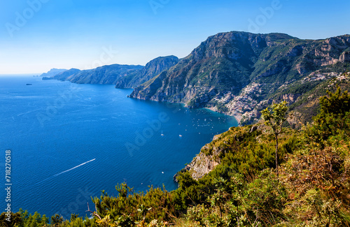 Amalfi Coast, Positano, Peninsula of Sorrento, Campania, Italy. View from Path of the Gods, Sentiero degli Dei. Town Positano on the right. Island Capri in the background. © Iryna Shpulak
