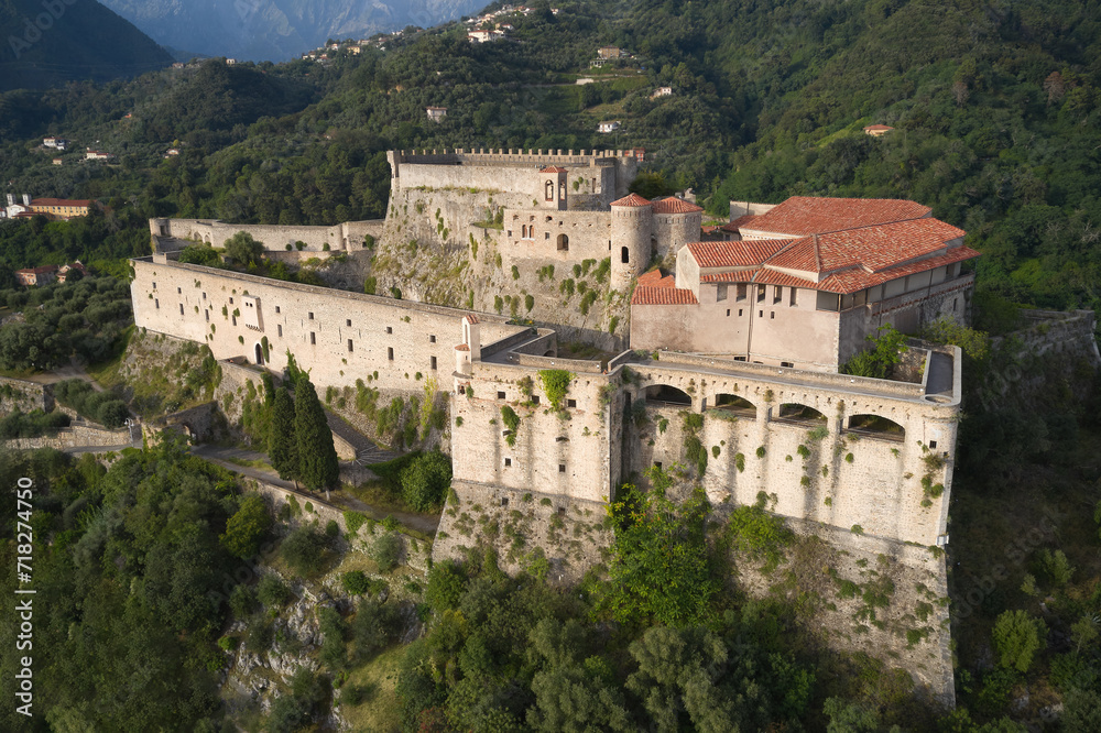 Historic castle in Italy aerial view. Aerial panorama of Castello Malaspina di Massa in Italy.