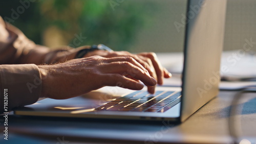 Bilde på lerret Unknown writer typing keyboard laptop at table close up