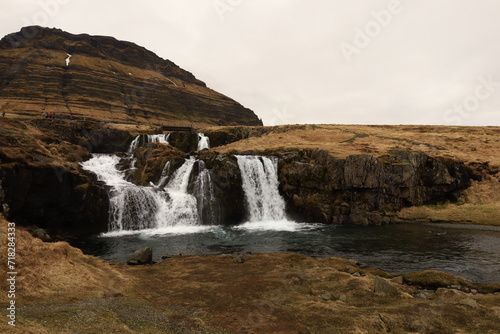 Fototapeta Naklejka Na Ścianę i Meble -  Kirkjufellsfossar is a waterfall in West Iceland on the Snæfellsnes peninsula