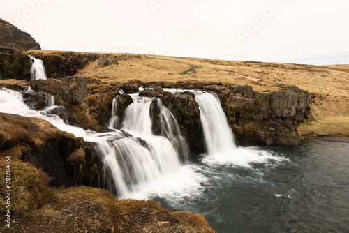 Fototapeta Naklejka Na Ścianę i Meble -  Kirkjufellsfossar is a waterfall in West Iceland on the Snæfellsnes peninsula