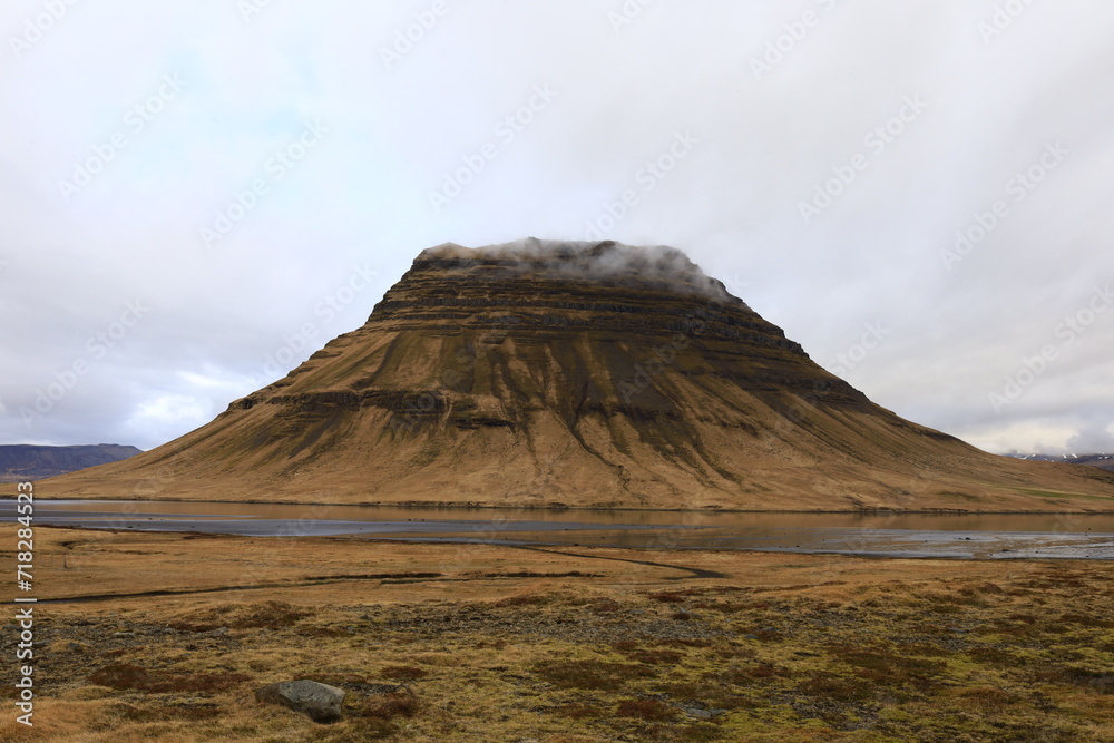 Obraz premium Kirkjufell is a remote mountain in Iceland, located on the Snæfellsnes peninsula