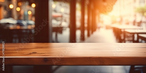 Blurry cafe interior with wood table.