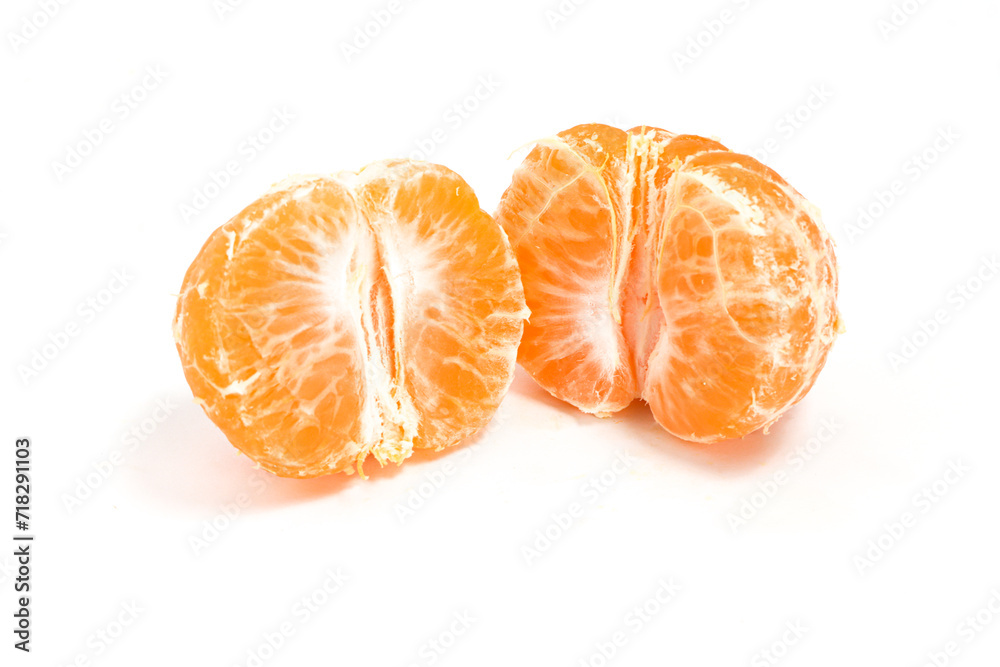Half cut peeled fresh organic orange delicious fruit isolated on white background clipping path Half cut peeled fresh organic orange delicious fruit isolated on white background clipping path